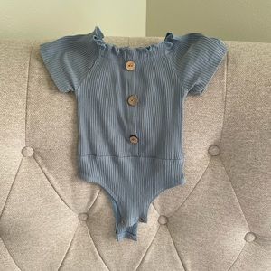 Reverie Threads Organic Cotton, Ribbed Off The Shoulder Ruffle bodysuit 12-18M